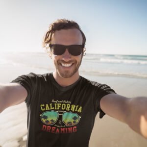 Man modeling the 'California Dreaming' tee by Wake Up Apparel, capturing the essence of California's iconic beach culture.